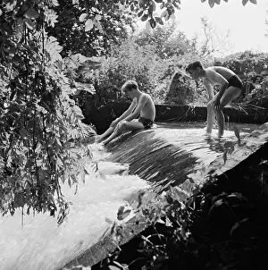 Latimer: Boys playing at a weir