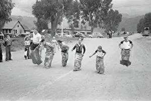 Hopping: Boys - race - competition - potato sack