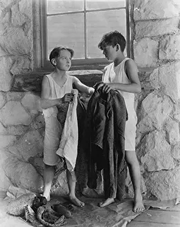 Underclothes: Boys removing their clothes outside