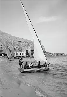 Carefree: Boys with their sailboat in Sicily, 1943