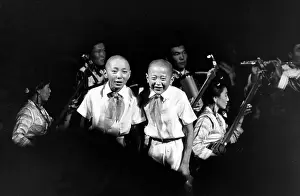Ulaanbaatar: Two boys singing in an Ulan Bator theatre, Mongolia