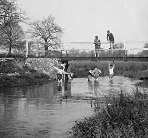 The Japics Historic Image Collection: Boys in a stream and on a bridge