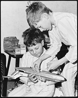 Excitedly: BOYS & TOY PLANE