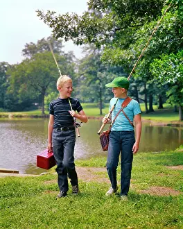 Twill: Two Boys Walking Along Lakeside Talking Carrying