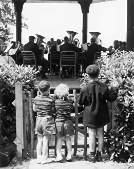 Bandstands: BOYS WATCHING BRASS BAND