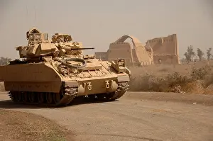 Ctesiphon: US Bradley Fighting Vehicle passes by the ?
