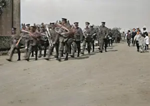 Tuba: Brass band marching along a road
