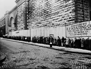 Breadline: Bread line beside the Brooklyn Bridge approach. ?