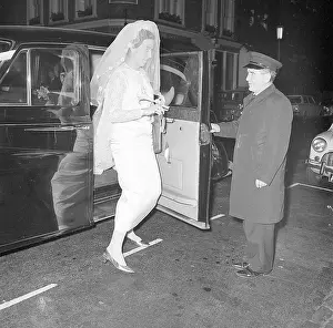 Veils: A bride getting out of a wedding car