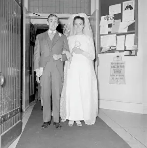 Husbands: The bride and groom at the Yateman Biggs Wedding