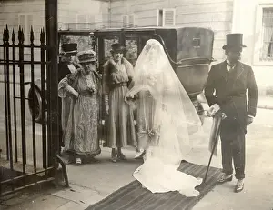 Prepares: A bride steps out of the car