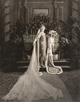 Wimple: Bride wearing medieval gown standing at altar
