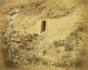 Adamson: Bridge and retaining wall on rock escarpment