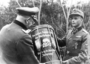 Totenkopf: Brigade Leader Helmut Bresser presents a drum