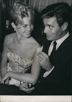 Trop: Brigitte Bardot and Louis Jourdan at Maxim's, Paris