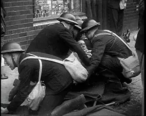Assisting: British Air Raid Wardens Attending A Phoney