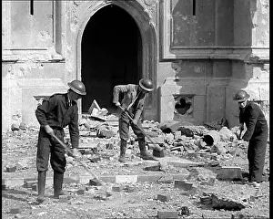 Wardens: British Air Raid Wardens Clearing Up Rubble