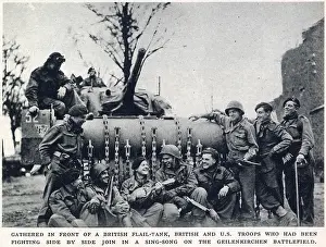Geilenkirchen: British and American troops singing beside a Tank