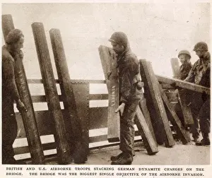 81st: British and American troops stacking dynamite on the Nijmege