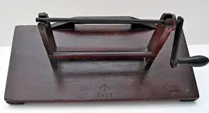 Puttee: British Army Issue puttee-winding machine