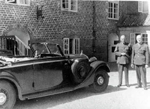 Convertible: Two British army officers with their car