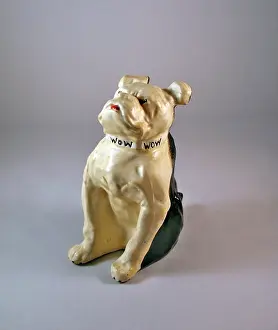 Downside: British bulldog with Bow, Bow, Bow around his neck