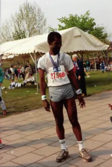 The British Caribbean History Collection: British Caribbean marathon runner standing with medal
