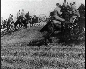 Uphill: British Cavalry Soldiers Pulling Field Guns Uphill