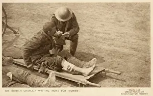 Dictating: British Chaplain writes for a wounded soldier