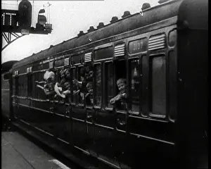 Evacuees: British Child Evacuees Waving Out of a Train