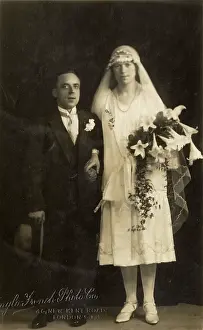 Disparity: British Couple - wedding photograph - height difference