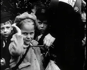 Evacuee: Three British Evacuee Children in Their Coats