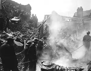 Lcgr1407: British firemen and civilians at wreckage caused