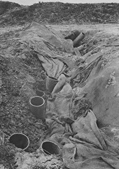 Discharged: British gas tanks in a ditch, WW1