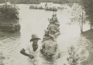 Southeast Asia: British Indian Army crossing a river in collapsible