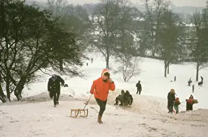 Anorak: The British at Leisure series -- people sledding