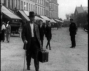 Limp: A British Man With A Limp Crossing A Street