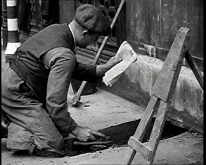 Announcing: British Man Reading Newspapers Announcing the
