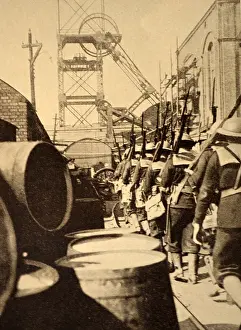 Embark: British marines embark at a port for the war in