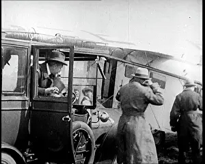 Motorcar: British Men Exiting A Motorcar and Entering