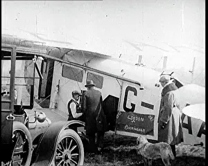 Motorcar: British Men Exiting A Motorcar and Entering