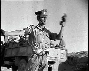 Motorised: A British Officer Directing Motorised Troops