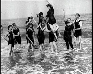 British Pathé Ltd: British People Dancing and Waving in the Sea