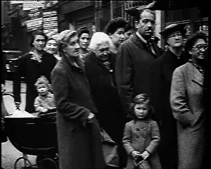 Queueing: British People Queueing For Food In London