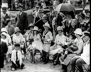 British Pathé Ltd: British People Sitting On Deck Chairs Watching