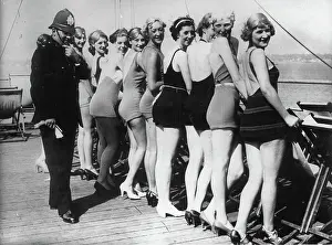 Great British Holiday: A British policeman (Bobby) with women