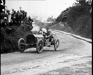 Speeding: British Racing Car Speeding Around A Corner