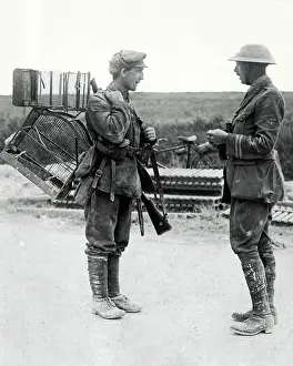 Cages: British soldier with birdcages, Western Front, WW1