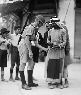 Political Movements: British soldier checking papers and searching Arabs