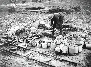 Tidying: British soldier cleaning up debris, Western Front, WW1